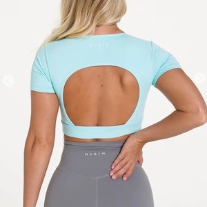 NVGNT NWT size M Aqua open back tee.